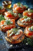 Smoked salmon bagels with blue cheese and dill photo