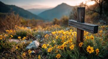 Wooden cross in the middle of a field with yellow flowers photo