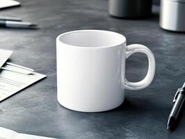 White Ceramic Mug On A Dark Gray Table with Pen and Paper Close Up Shot photo