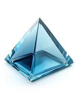 Transparent Blue Pyramid Sculpture Isolated on White Background With Geometric Shapes and Light Reflection photo