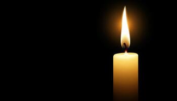 Single Lit Candle Against Dark Background photo