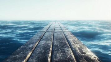 Wooden Dock Extending into a Calm Blue Ocean photo