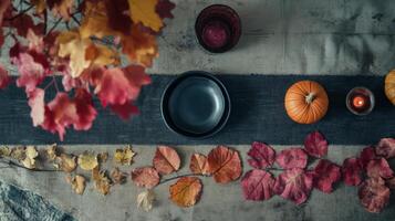 Autumnal Table Setting with Pumpkins and Leaves photo