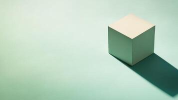 Minimalist cube casting shadow on colored surface photo
