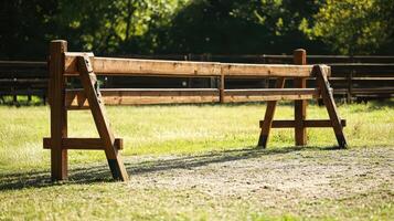 Wooden hurdle in equestrian field photo