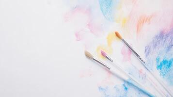Colorful paint strokes with art brushes on canvas photo