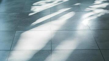 Light and shadow patterns on a tiled floor photo