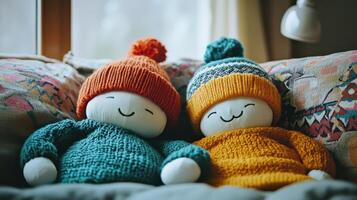 Warm cuddly dolls relaxing on a cozy couch photo