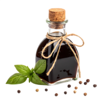 Balsamic vinegar in a glass bottle with basil and peppercorns. png