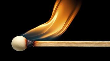 Burning Matchstick Close up on Black Background photo