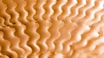 A close up of a wavy pattern on a surface photo