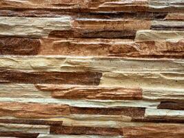 Textured Stone Wall with Layered Tones photo