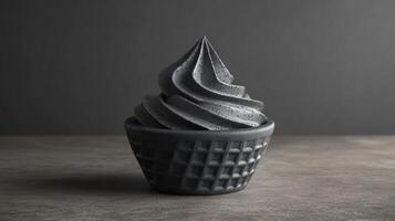 Dark, decadent frozen dessert in waffle cone photo