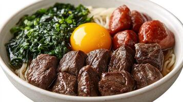 Beef noodle soup with egg and seaweed photo