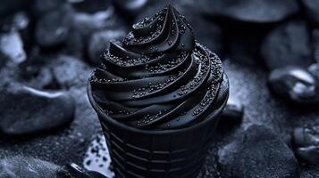 Dark dessert treat in waffle cone photo