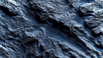 This backdrop features a textured surface in shades of deep blue and gray, suitable for eco-themed mockups and designs requiring a natural aesthetic. photo