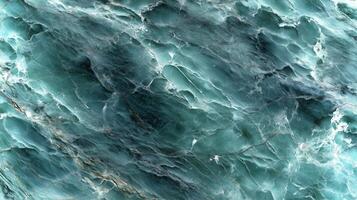 This unique abstract backdrop features beautiful aqua and dark teal marble textures ideal for various design applications, providing ample copy space for creativity. photo