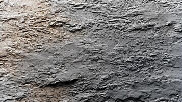 A textured surface featuring a mix of rough and smooth areas, evoking an organic feel with muted earthy hues. photo