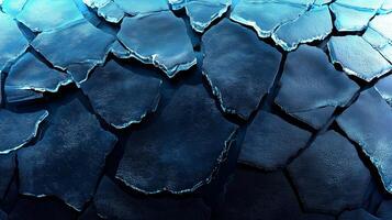 A cracked blue texture serves as an appealing backdrop for eco-themed designs, ideal for showcasing innovative concepts and ideas. photo