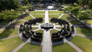 Aerial perspective showcasing seating for a ceremony arranged in a circular pattern around a central stage. photo