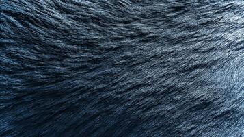 Close-up of a soft, textured animal fur surface forming a dark backdrop suitable for various design projects and promotional materials featuring eco-friendly themes. photo