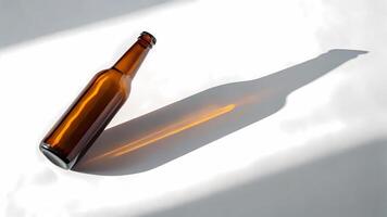 Amber Bottle Casting Long Shadow on White Background photo