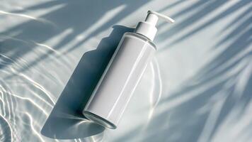 Lotion Bottle on Surface with Water Reflection and Shadow photo