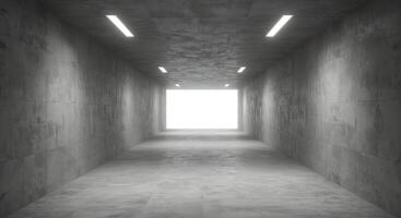 A long empty tunnel with light coming from the ceiling photo