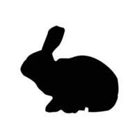 A black silhouette of a rabbit on a white background vector