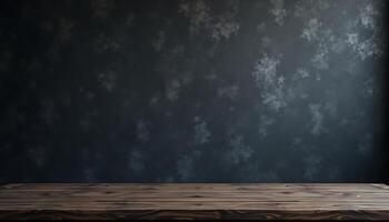 Empty wooden table in front of dark wall photo