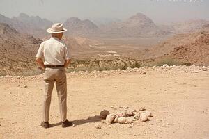 A man standing in the desert photo