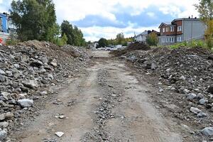 A dirt road with a lot of rocks and gravel photo