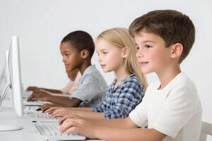 Children sitting at computers with one on each side photo