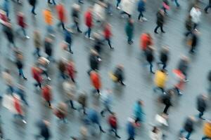 An abstract image of people walking in a crowd photo