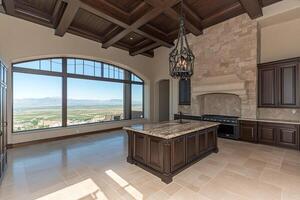 A kitchen with a view of the mountains photo