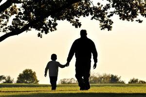Father and son walking in the park photo
