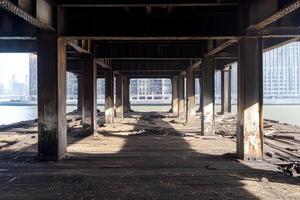 A view of a building with a bridge over it photo