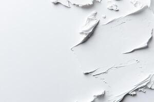 A close up of a white wall with a crack in it photo