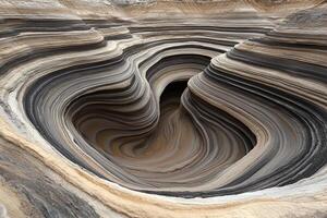 A large rock formation with a heart shape in it photo