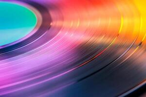 An image of a vinyl record with a colorful background photo
