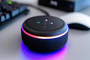 A small speaker with a glowing light on it photo