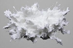 A splash of milk is shown on a gray background photo