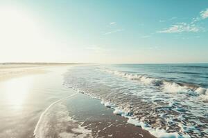 Empty beach and sea wave under sunlight. photo