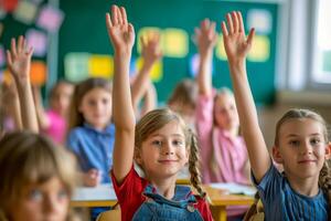 Students with raised hands in class photo
