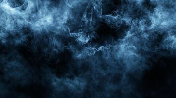 Mysterious blue smoke swirling in darkness creates an ethereal atmosphere and captivating visual effects in a dramatic setting photo