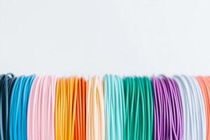 Colorful assortment of craft wires arranged in neat rows for artistic projects and creative endeavors photo