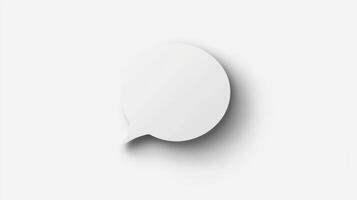 Blank paper speech bubble isolated on a clean white background for creative communication and design purposes photo