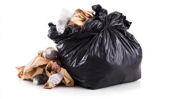 A pile of garbage including plastic and paper waste on a white background highlighting the need for better waste management practices photo