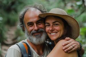 Couple in hiking gear joyfully embracing in peaceful forest trails, enjoying nature and each other's company photo