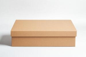 Minimalist cardboard box on a white background offers a blank canvas for creative mockup designs and branding opportunities photo